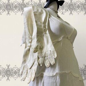 vintage white kidskin leather opera-length gloves featuring pearl buttons